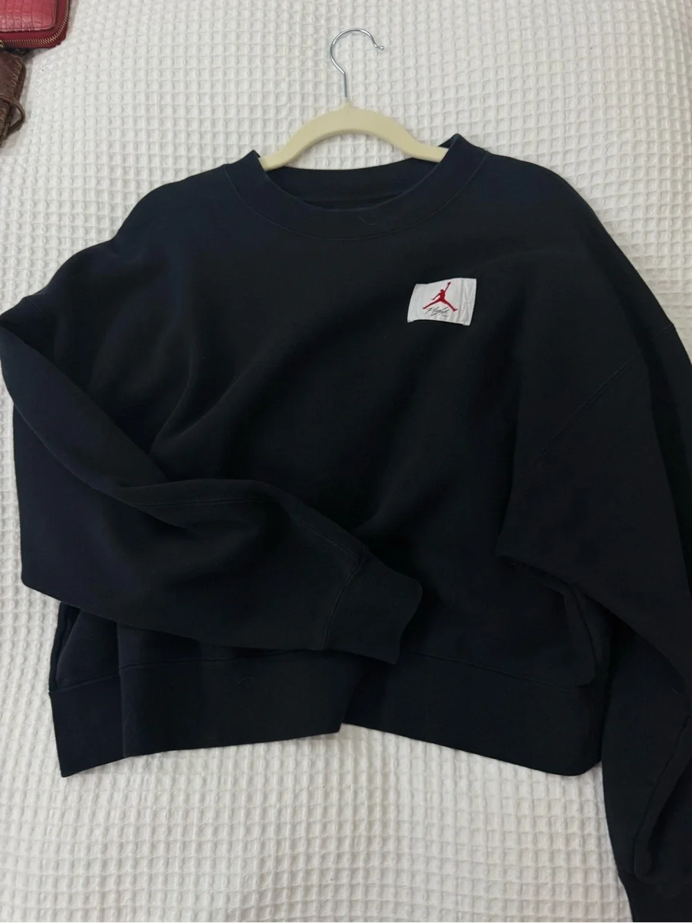 Jordan Black Crewneck Sweatshirt with Red Jumpman Patch